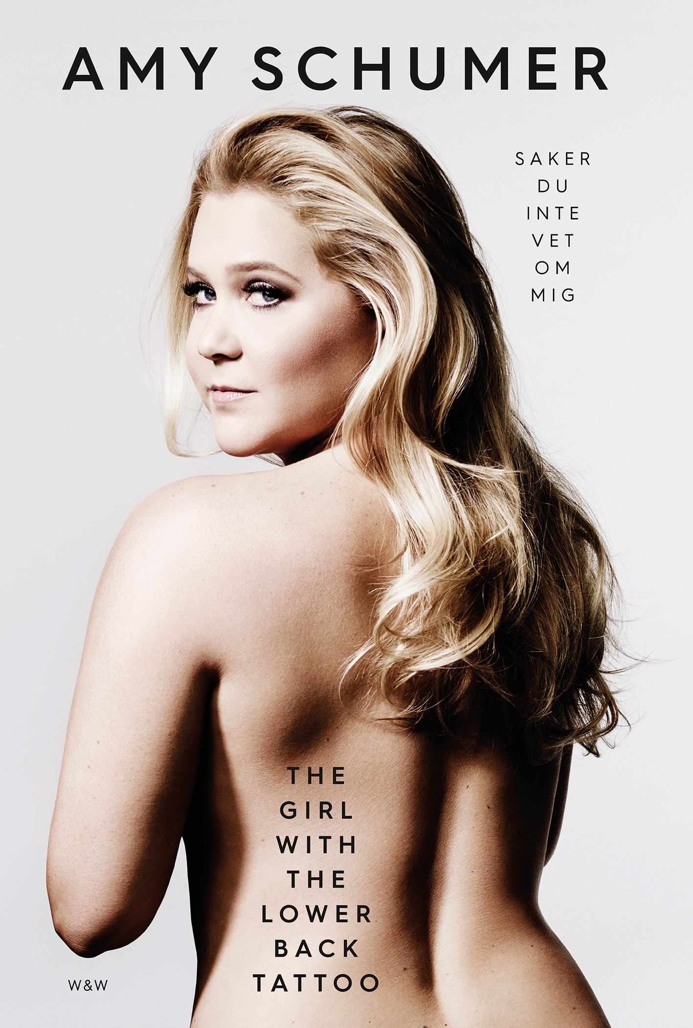 Amy Schumer - The girl with the lower back tattoo